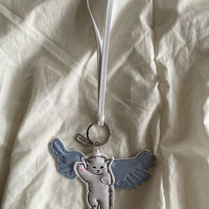 Aritzia leather bag charm